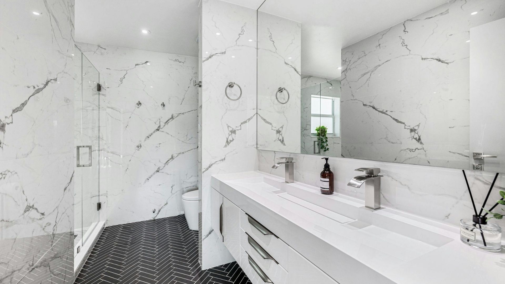 Luxury bathroom remodeling with marble finishes